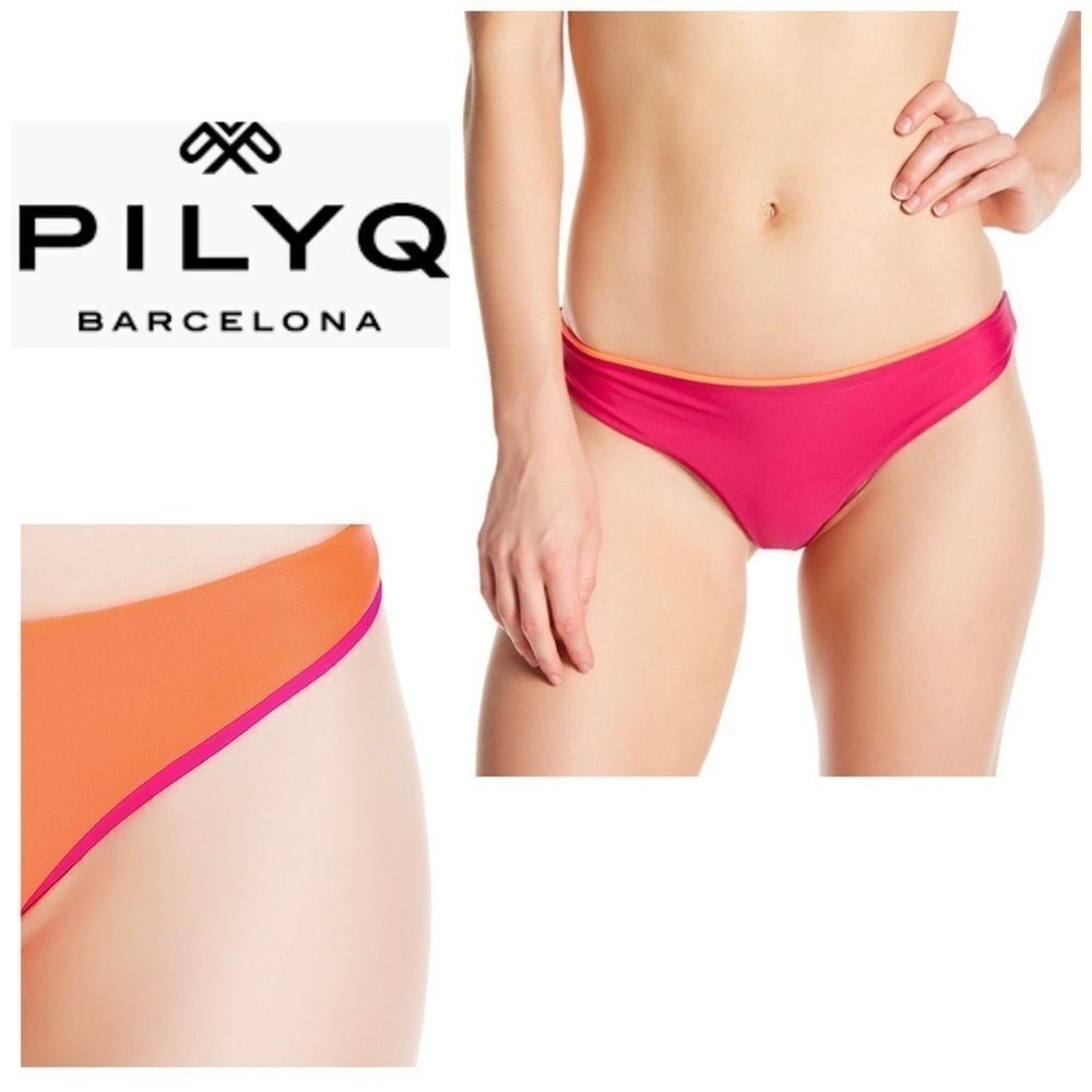 PILYQ bright orange/fuchsia reversible bottoms. Large